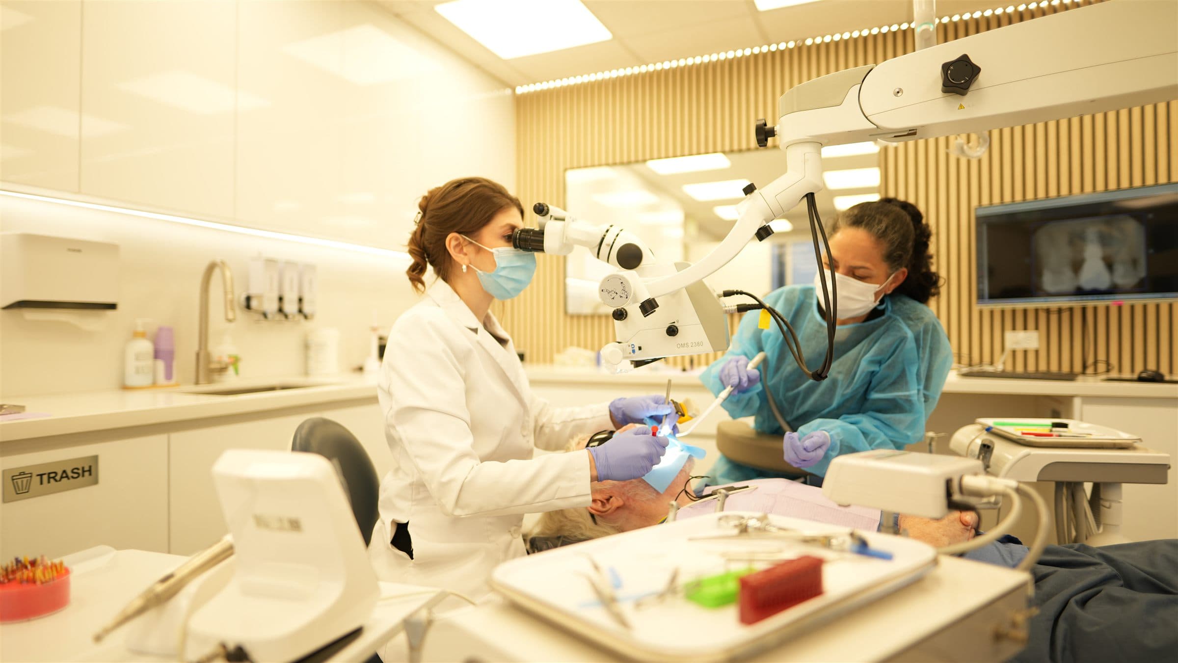 Modern endodontic treatment room with microscope at Solar Endodontics